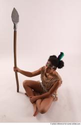 ANISE SITTING POSE WITH SPEAR